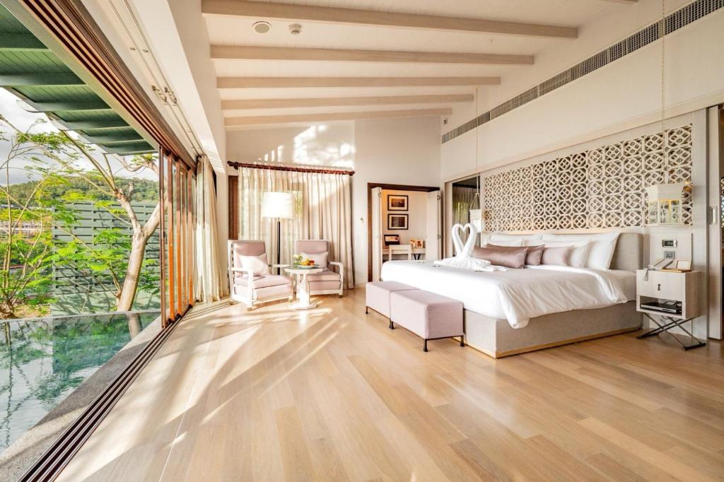 Romantic couple watching sunset at Phuket beach resort