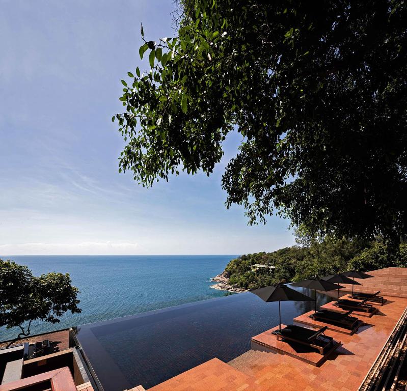 Couple relaxing at Phuket cliffside resort