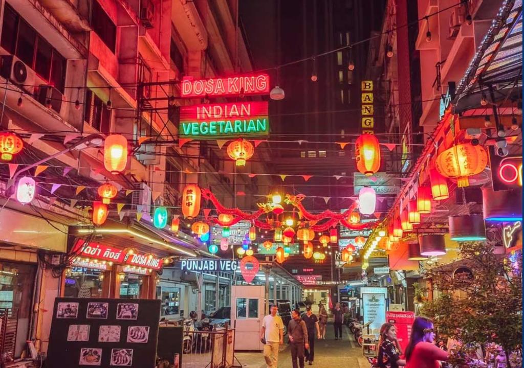 Parents and children at hotel breakfast in Bangkok