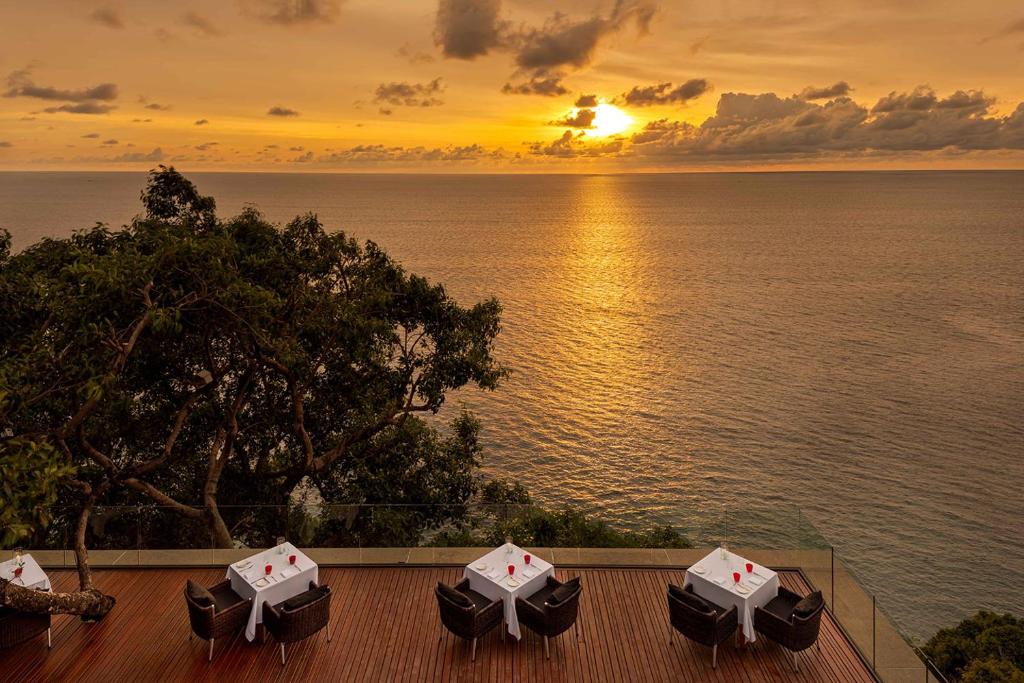 Couple relaxing at Phuket cliffside resort